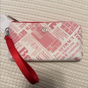 NWT Lululemon Curved Wristlet *Manifesto Print